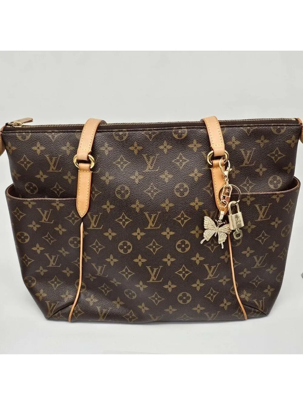 Louis Vuitton Authentic Gold Lock 🔒 Unbranded Butterfly Keychain for Bags